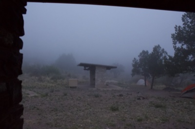 Foggy Campsite With Stone Shelter