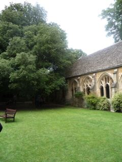 Gothic cloister courtyard with lawn