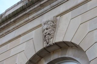Lion Head Stone Carving on Building