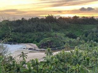 Tropical Coast Sunset Over Lush Hills