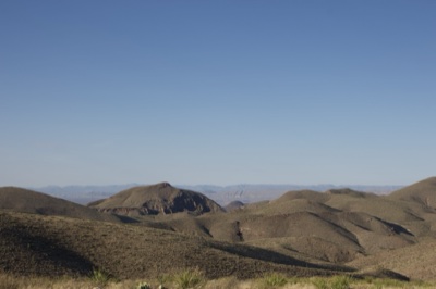 Arid Desert Hills Under Clear Sky