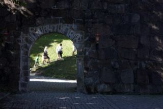 Stone Archway Framing Park Path