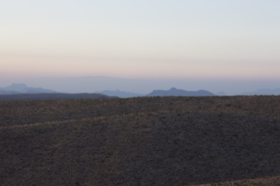 Desert Hills Under Twilight Sky