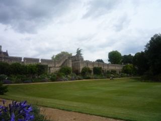 Castle Wall Over Green Lawn