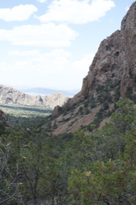 Rocky Canyon Valley Under Partly Cloudy Sky
